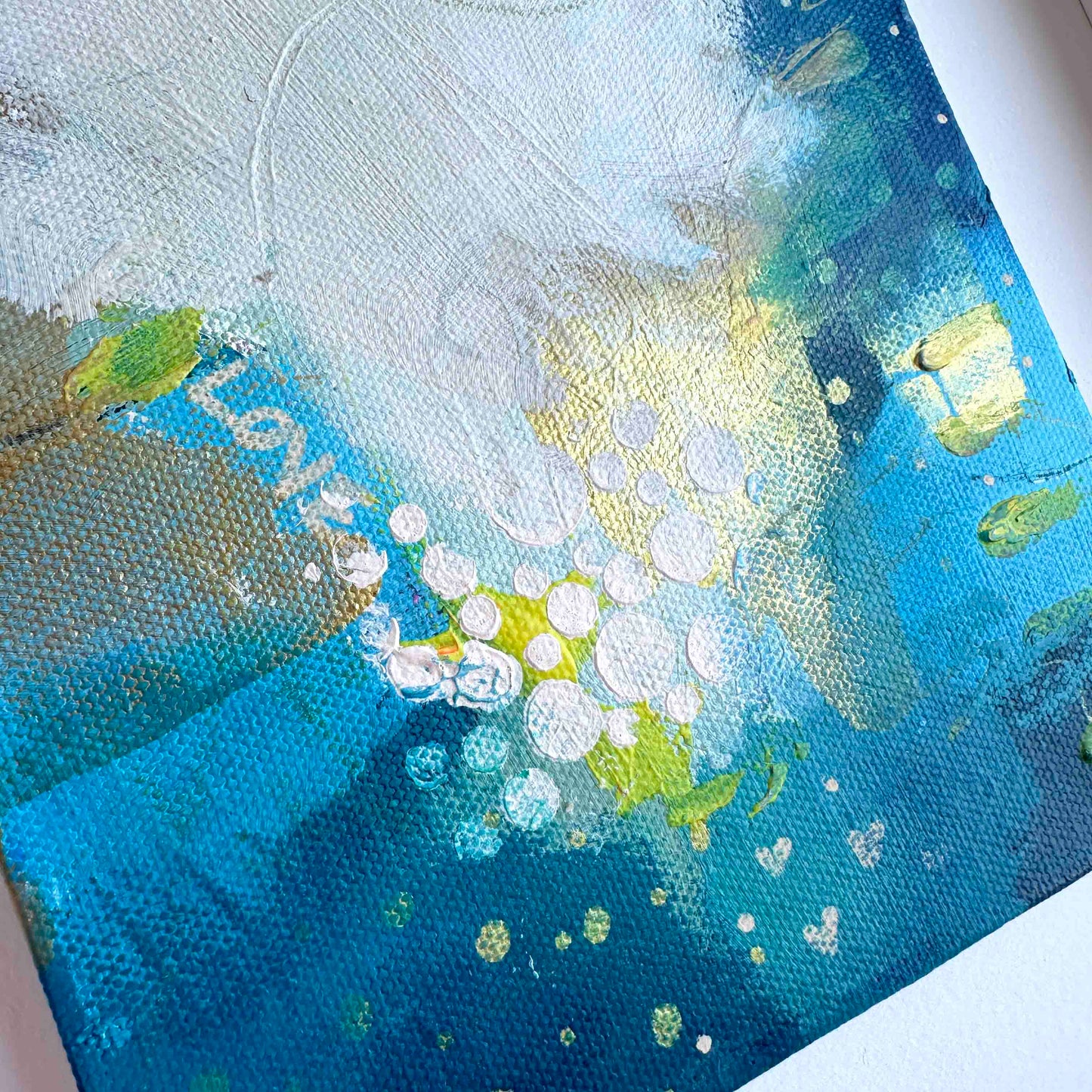 Small abstract original painting inspired by the colours of the ocean in Cornwall.  The words Love and Joy can be found within the painting