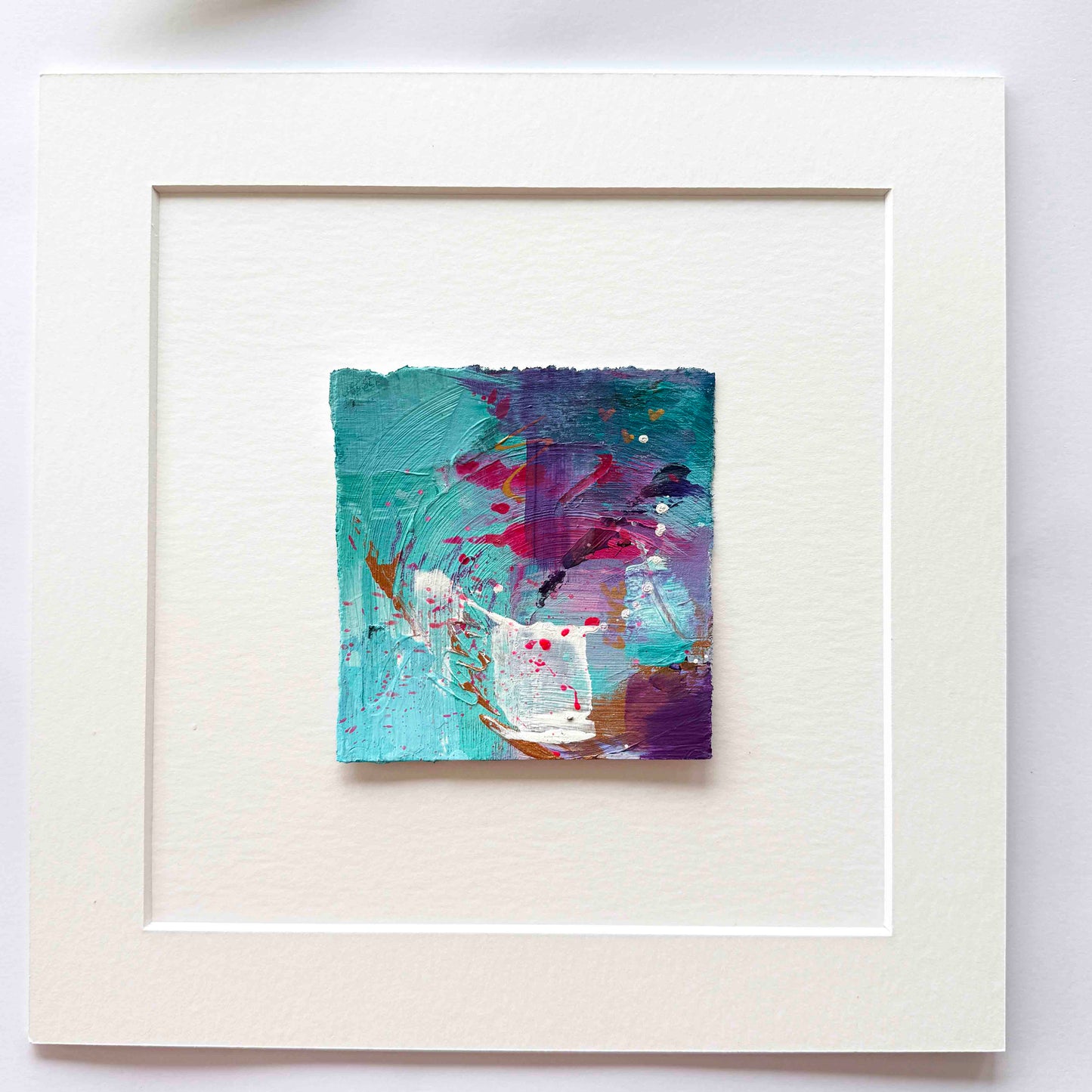 Abstract mini painting in pink, purple, copper and aqua blue with the word love 