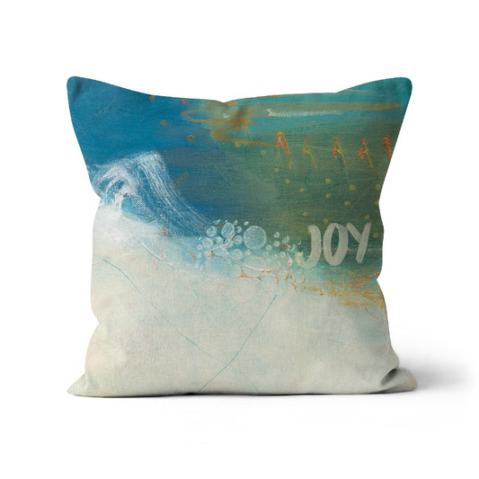 peridot cushion with accents of orange and the joy amongst the cream, blues and greens.