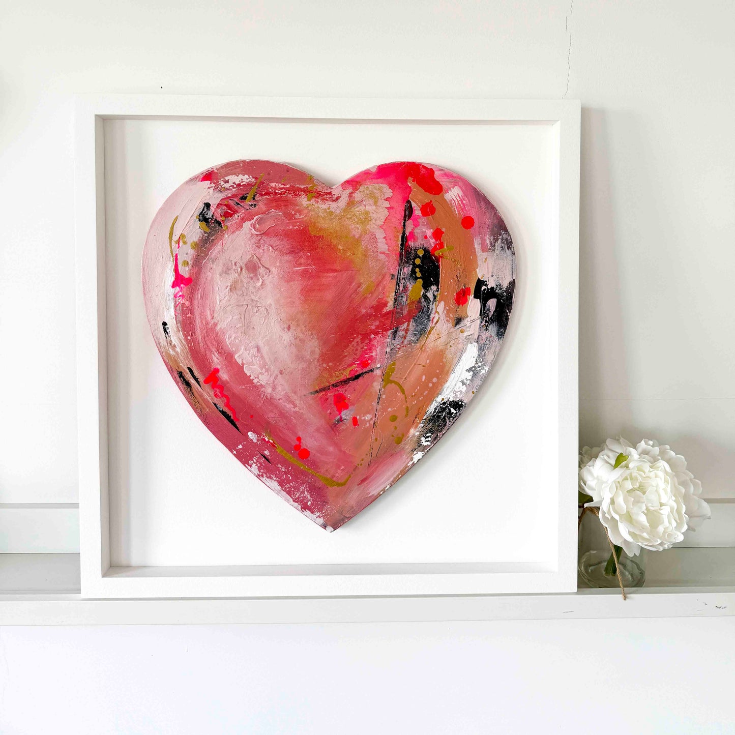 Abstract heart painting in pinks and golds